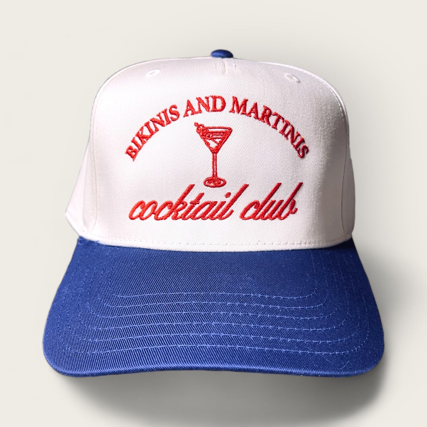 Bikinis and Martinis Cocktail Club Classic Trucker Hat | White/Royal